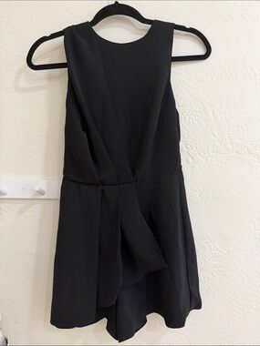 Lulus Classic Black Sleeveless Cocktail Romper with Asymmetrical Front Detail